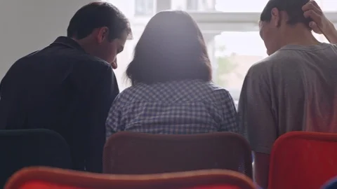 College students comparing notes in their notepads Stock Footage 105190712