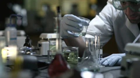 College students do experiments in a chemistry lab Stock Footage 33879257