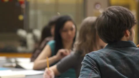 College students do group work during a lecture Stock Footage 33878626