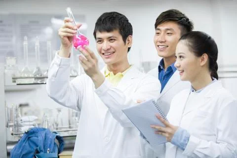 College students doing experiment Stock Photos