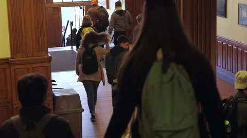 College Students Getting Out of Class Walking Around Academic Building Stock Footage 60143368