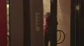 College students hanging out on campus. People going out through the door HD Footage