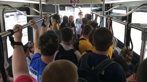 College students jam packed into bus Stock Footage 66579107