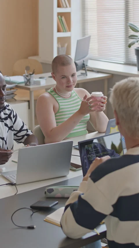 College Students Learning Programming Language and Having Talk Stock Footage 257746634