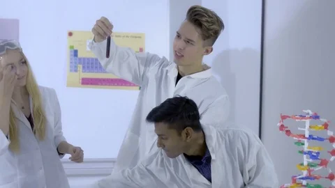 College students making chemistry experiments in science class Video stock 74623454
