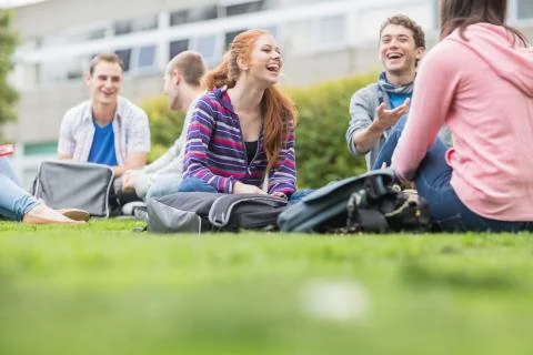 College students sitting in the park Stock Photos