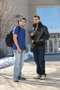 College Students Standing Stock Photos