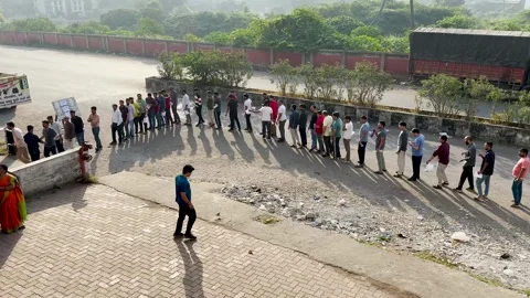 College students standing in queue outdoors near exam center. Stock Footage 254473827