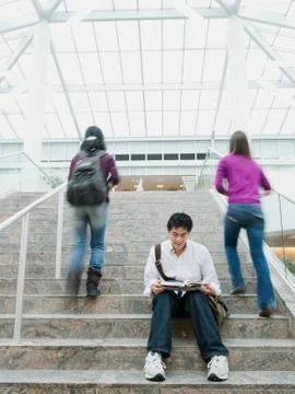 College students on steps in front of library Stock Photos