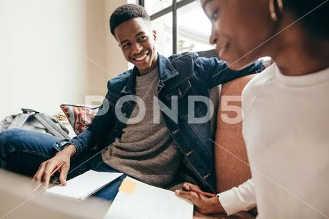 College students studying together in campus Stock Photos