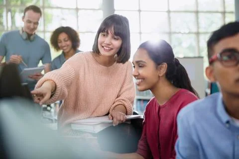 College students talking in classroom Stock Photos