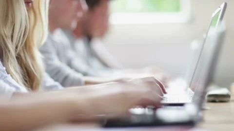 College students typing on laptops Video stock 8827889