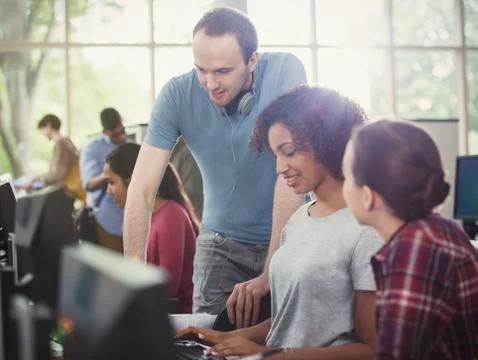 College students using computers in computer lab 스톡 사진
