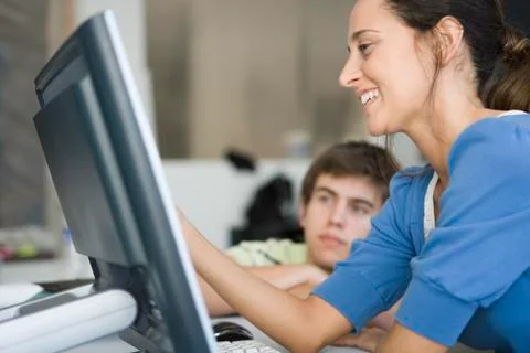 College stuents working on computer assignment Stock Photos