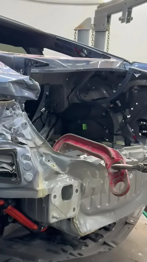 Collision Damaged Car Front End on Frame Machine in Repair Shop Video stock 348691455