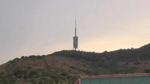 Collserola communications tower hill overcast sundown aerial antenna Barcelo Stock Footage 327217256