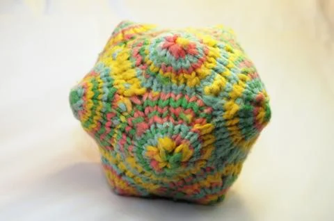 Coloful knitted yarn polygon math-toy (Macro detail) Stock Photos