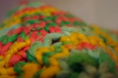 Coloful knitted yarn polygon math-toy (Macro detail) Stock Photos