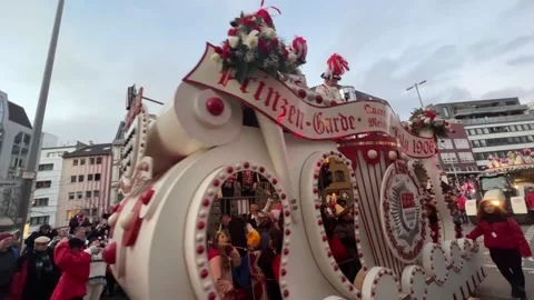 Cologne carnival float with horses in red white Stock Footage 297347308