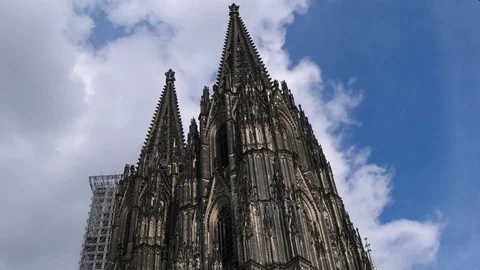 Cologne cathedral Koelner Dom spire on blue sky with white clouds timelapse Stock Footage 80637190