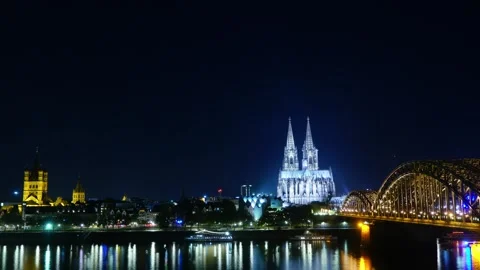 Cologne Cathedral landscape view with A bridge spans a river with a cathedr.. Stock Footage 313416838