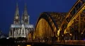 Cologne Cathedral Skyline Train Passing Dusk Light Rush Hour People Walk Commute HD Footage