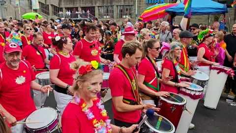 Cologne CSD Parade Red Samba Drumming Troupe Performance 2026 Stock Footage 341284292