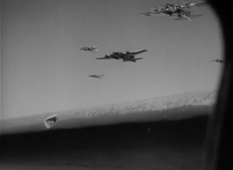 COLOGNE, GERMANY - 1944: Intake scoop - A formation flies beyond the wing Stock Footage 344600656