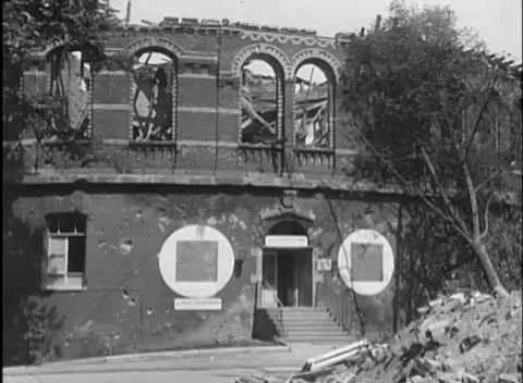 COLOGNE, GERMANY - 1945: Painted wall discs - Painted discs flank a doorway Stock Footage 344599925