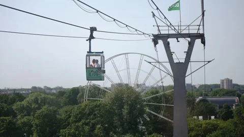 Cologne, Germany - Jul 20, 2023: Cable car gondolas transporting tourists fro Видео 330109424