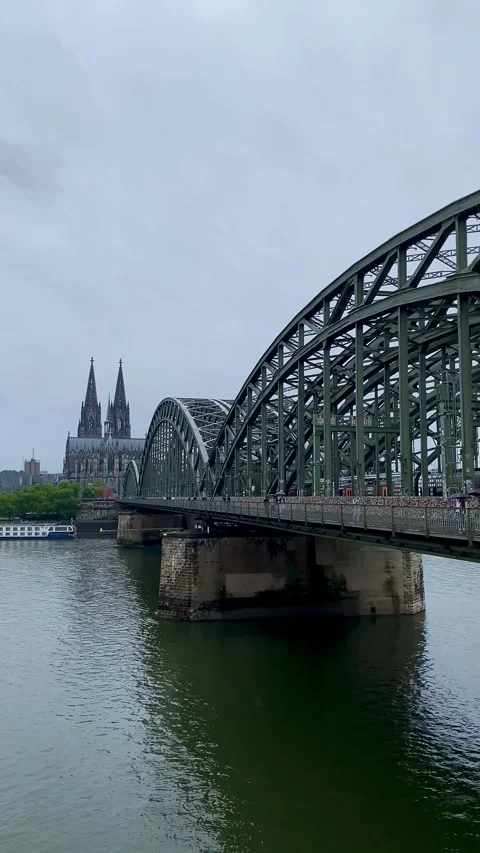 Cologne, Germany - July 6, 2025: Cologne Cathedral and Hohenzollern Bridge. Video stock 342001776