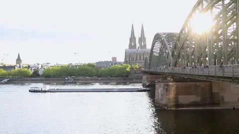 Cologne, Germany, May 19, 2025: Cologne Cathedral and Hohenzollern Bridge  Stock Footage 309566393