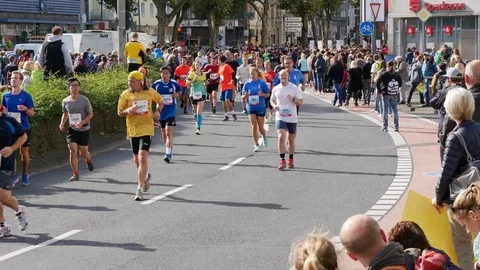 Cologne, Germany - October 1st, 2017: Timelapse of runners of cologne marathon Stock Footage 80593062