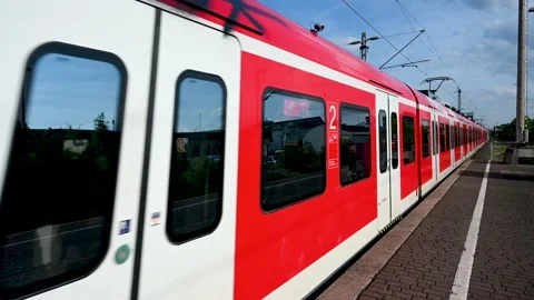 Cologne, Germany: Passenger train speeding through station. Rail transport Video stock 222974654