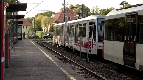 COLOGNE, GERMANY - SEPTEMBER 16, 2017: A modern tram departs from tram station Stock Footage 84900991