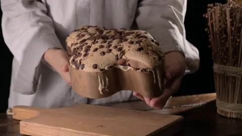 Colomba with chocolate. Easter Italian cake with almonds and chocolate in the Stock Footage 233622296