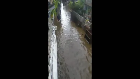 Colombia: Another Round Of Rain Causes More Major Floods In Medellin Video stock 203836126