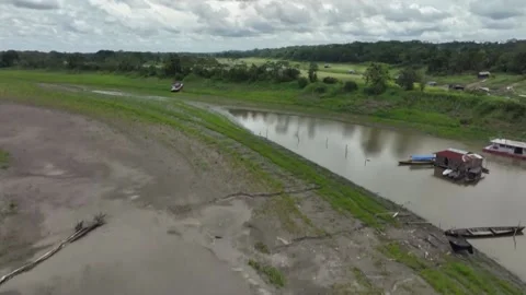 Colombia: Sharp drop of Amazon River level affects livelihood of Colombians Stock Footage 288008643