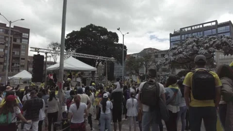 Colombian protesters during a 'call to list' of the people murdered by the state Stock Footage 153872016