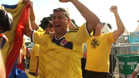 Colombians celebrating victory against Ivory Coast in World Cup Stock Footage