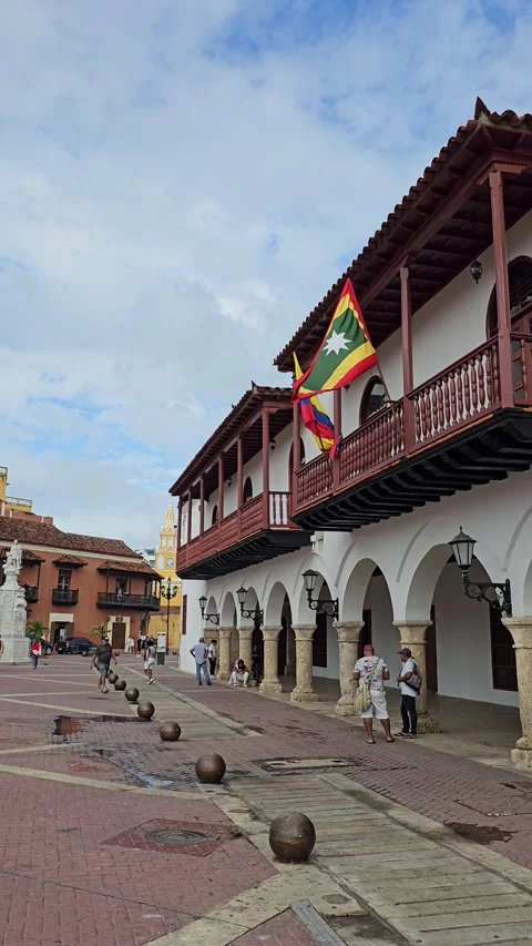 Colonial arcade balcony with flags, Colombia Vertical 4K Video stock 348257053
