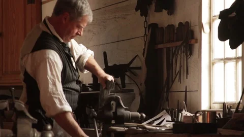Colonial Blacksmiths Working Metal Tools, Pounding Iron - Recreation Stock Footage 106672660