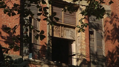 Colonial British Architecture: Neglected Window . Yangon colonial heritage Stock Footage 114826606