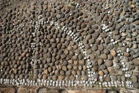 Colonial cobblestone ground Stock Photos