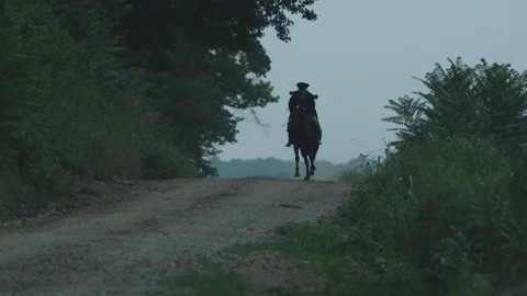 Colonial Horseman Gallops On Dirt Road - Paul Revere Stock Footage