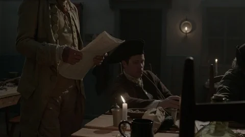 Colonial Man reads document, Declaration of Independence in 1700s Tavern 스톡 동영상 93699990
