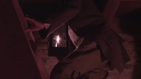 Colonial Men carry lanterns in old Church - 1775 Stock Footage 83708553