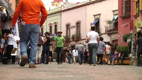 Colonial Mexico streets traffic art people downtown life real estate Stock Footage