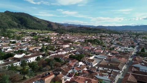 Colonial townscape with red tile roofs, Scenic aerial flight over historic Stock Footage 319862102