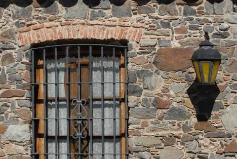 Colonial window and lantern Stock Photos